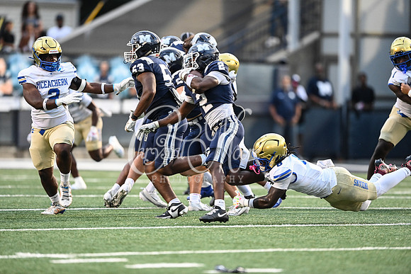 Class AAAAAA football action with Marietta taking on McEachern in their home opener