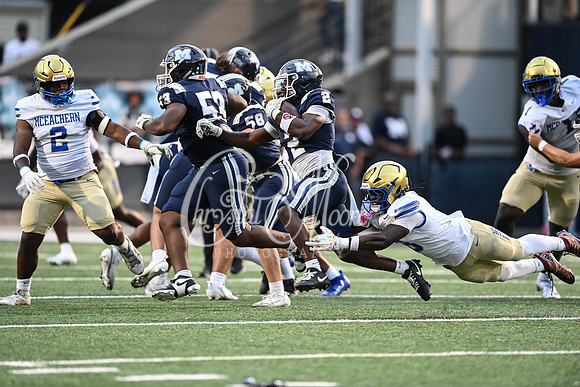Class AAAAAA football action with Marietta taking on McEachern in their home opener
