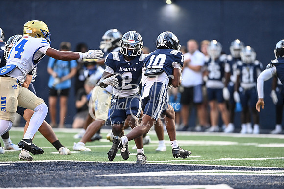 Class AAAAAA football action with Marietta taking on McEachern in their home opener