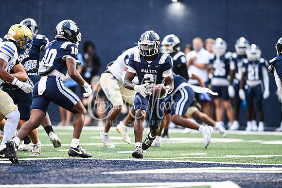 Class AAAAAA football action with Marietta taking on McEachern in their home opener