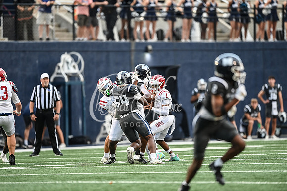 Hillgrove fumbles during Class AAAAAA football action against Marietta