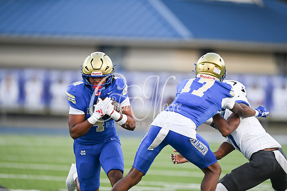 Class AAAAAA football action with McEachern taking on Campbell