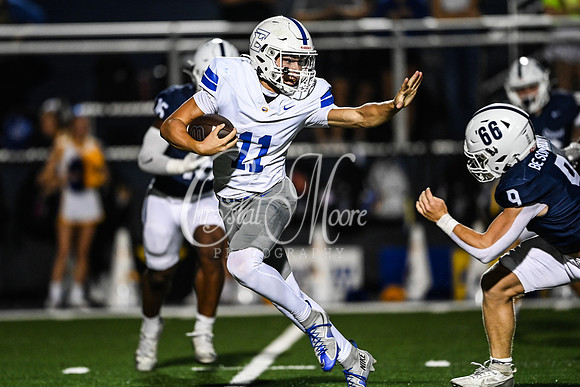 Zeke Douglass, Junior (11) attempting to get away during class AAAAAA football action with Marietta taking on Etowah