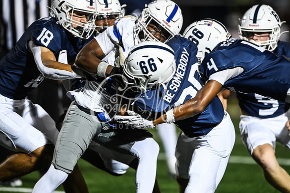 Marietta in throwback Lemon Street jerseys with the phrase “Be Somebody” on the back during Class AAAAAA football action against Etowah