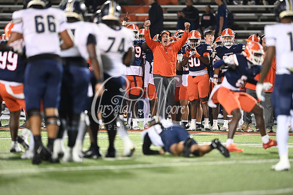 North Cobb celebrating on the sidelines after sack during second round GHSA Class AAAAAA football action against Douglas County