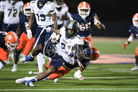 Tackle by Jayden Hamlette, Junior (23) during second round GHSA Class AAAAAA football action against Douglas County
