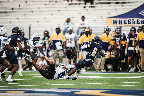 Corey Mwati, Senior (15) with the tackle during Region 5AAAAAA Wheeler vs Region 3AAAAAA Campbell in Friday Night Football Action on August 21, 2026 - Marietta, GA. Special - Chrystal Moore.