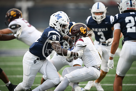 Tackle by Dylan Murakawani, Senior (9) during Region 5AAAAAAA Marietta vs District 5 AAAAAA St. Cloud (FL) game