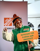 Florida A&M University fan celebrating at the Celebration Bowl Fan Zone on December 16, 2023