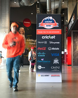 Fan walking by the Celebration Bowl sponsor signe before the game on December 16, 2023